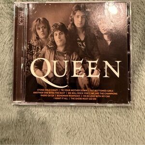 Que Greatest Hits CD - Brown Cover